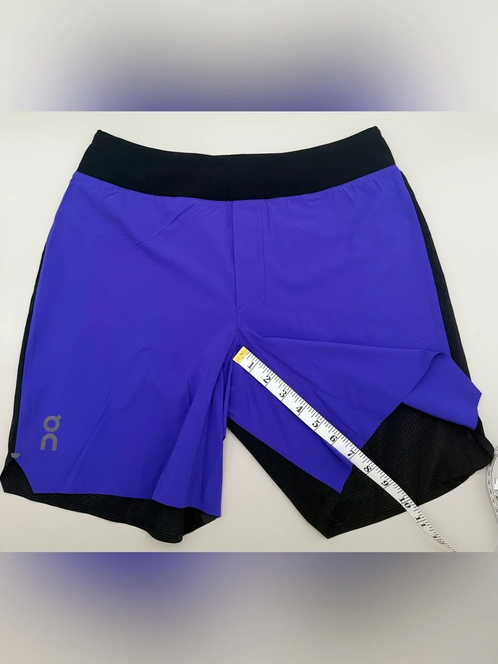 On Running Black Waistband blue and black Men Running Shorts size men’s Medium.